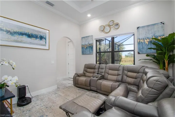 Living room featuring ornamental molding