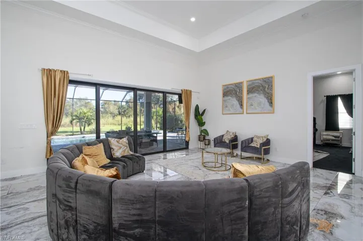 Living room featuring ornamental molding