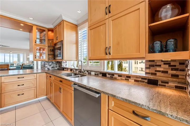 Kitchen has view to Gulf
