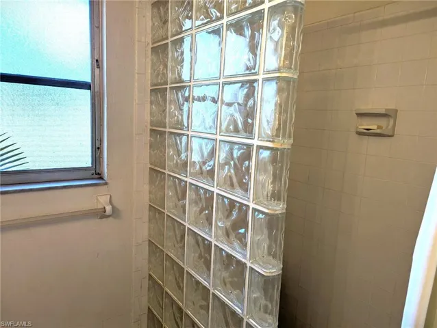 Bathroom with a tile shower