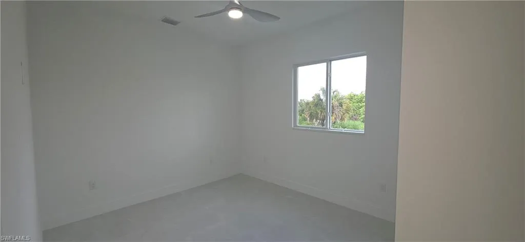 Neutral wall tones complementing light-colored flooring