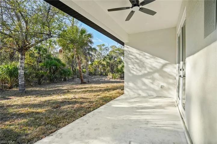 View of patio with a ceiling fan