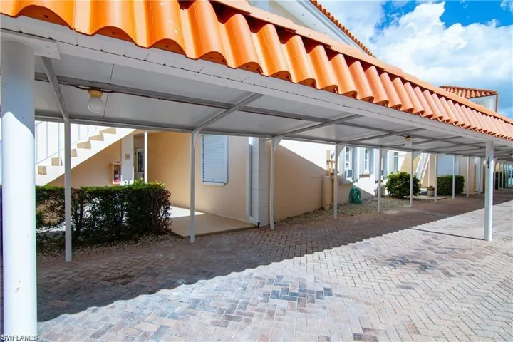 View of patio / terrace featuring stairway and a pergola