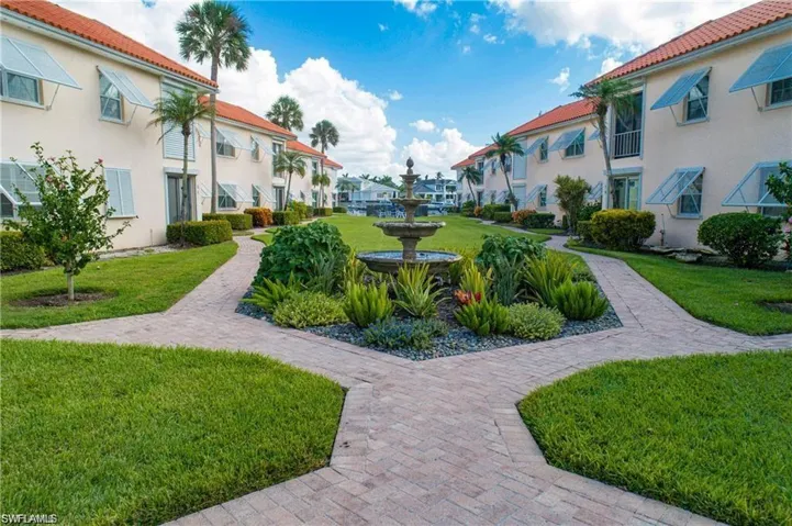 Surrounding community featuring a yard and a residential view