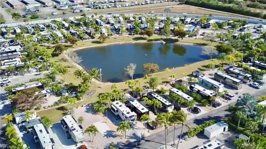 Aerial view of residential area featuring a large body of water