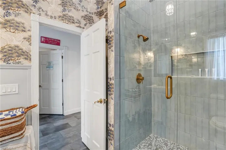 Full bathroom featuring a stall shower - Virtually Edited Image