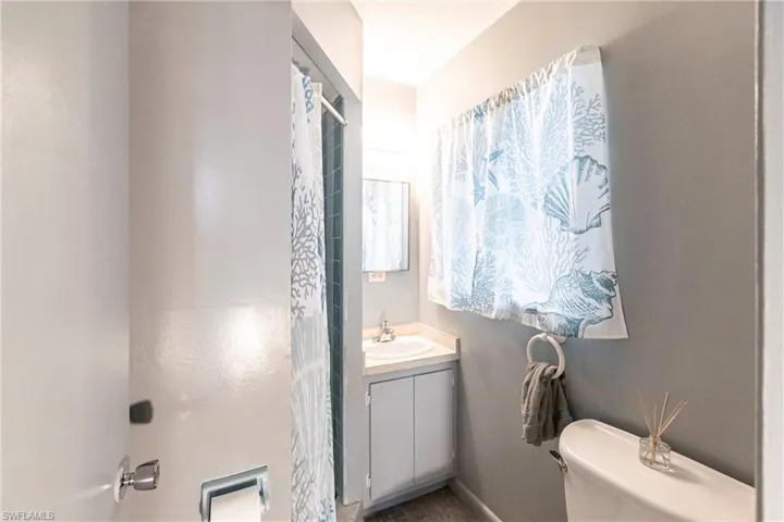 Bathroom with toilet and vanity