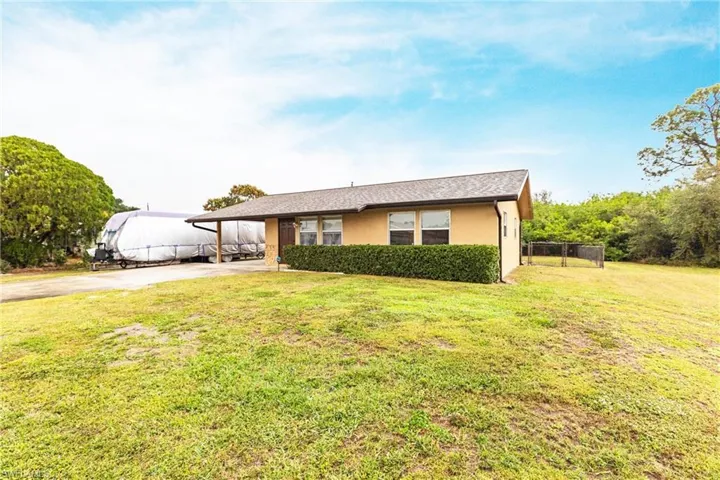 View of front of home with a front lawn