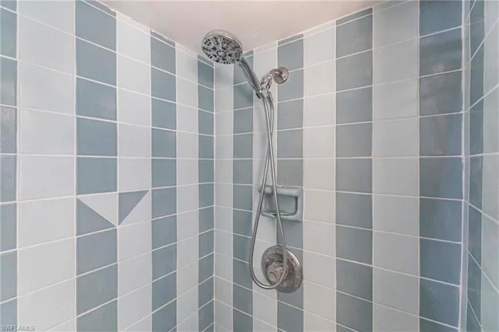 Bathroom with a tile shower