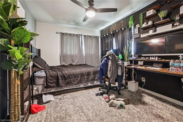 Bedroom featuring ceiling fan