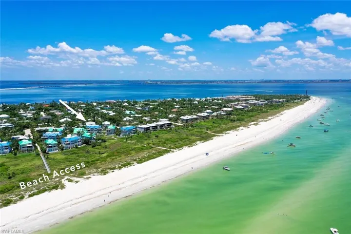 Bird's eye view featuring a beach view and a water view