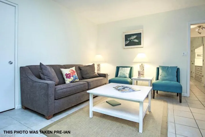 Living room featuring light tile patterned floors