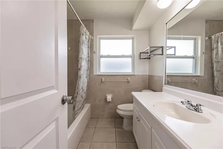 Full bathroom with tub shower combo