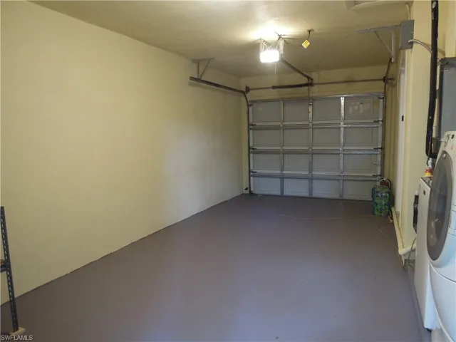 View of garage before storage items placed in it.