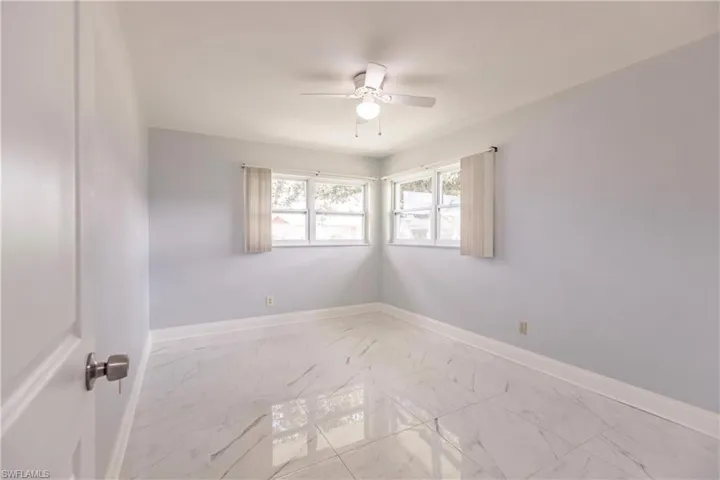 Bedroom 2, tile floors and newer windows