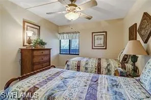 Bedroom featuring a ceiling fan