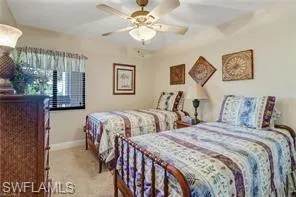 Bedroom featuring carpet floors and ceiling fan