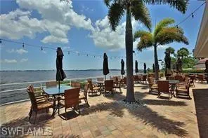 View of patio / terrace featuring a water view