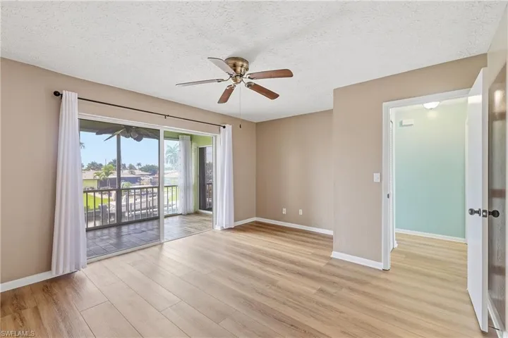 Primary bedroom measures appx 16'x12' and has slider access to lanai.