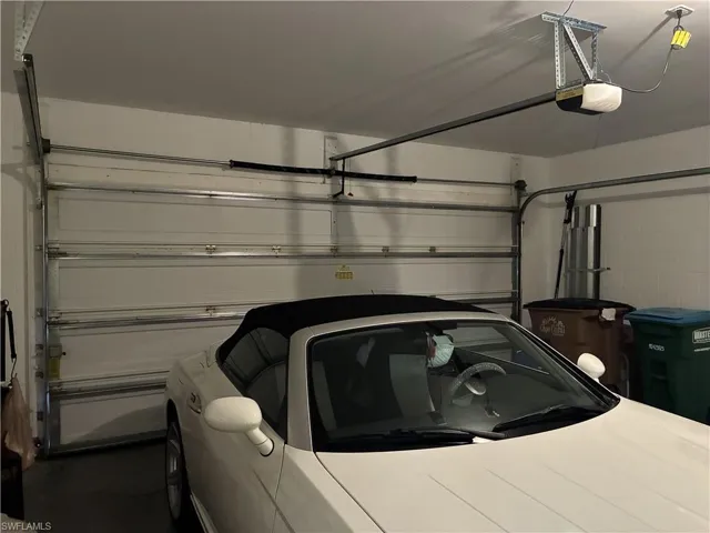 Two car garage equipped with hurricane code door.