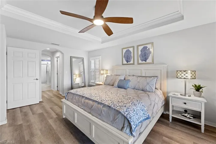 Master hall leads to walk-in closets and ensuite bath