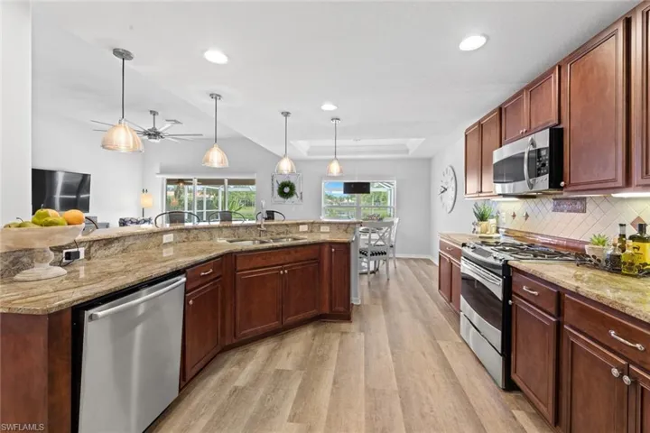 Kitchen looking towards breakfast area and family room
