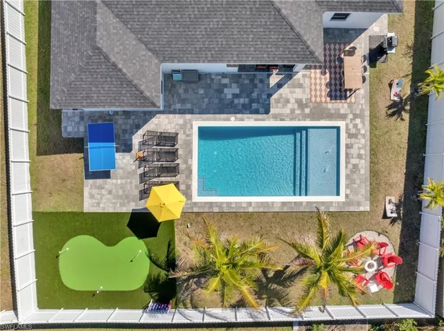 View from above of property with a pool