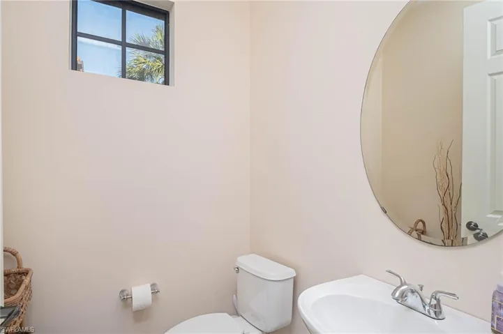 Bathroom featuring toilet and sink