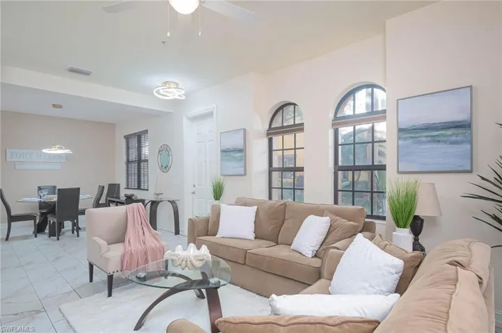 Living room featuring ceiling fan
