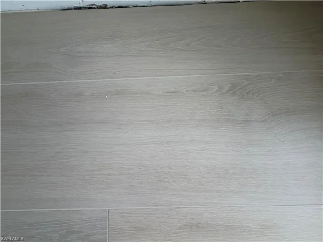 New Flooring tile installed throughout condo and on balconies.