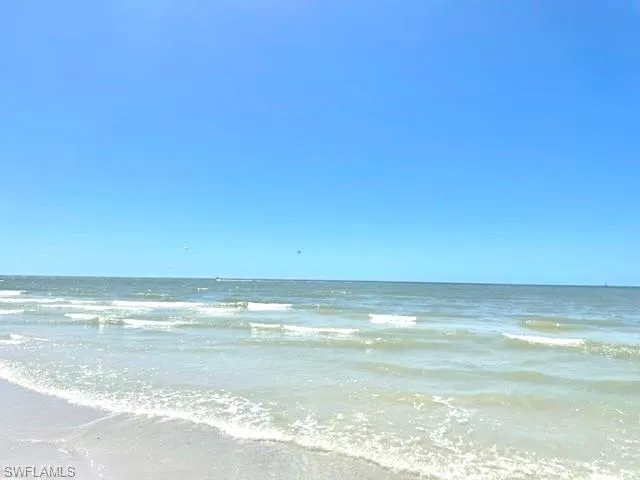 Tranquil lapping the sugar sand shores of the Gulf