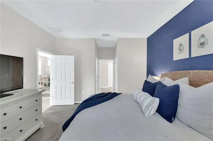 Bedroom featuring carpet floors