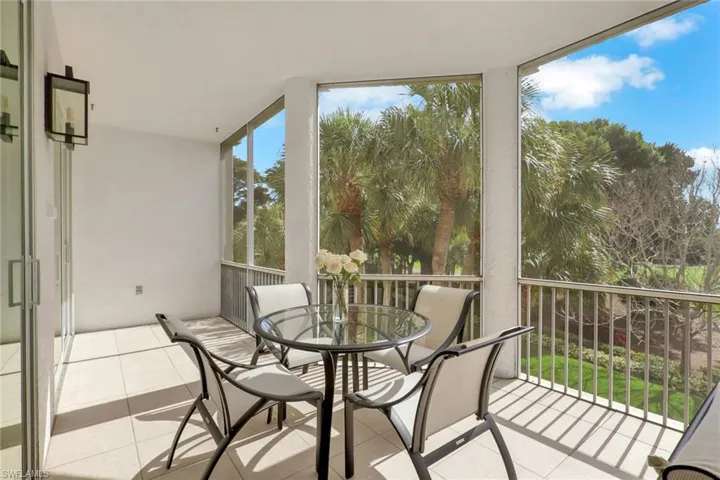 Sunroom with tile patterned floors