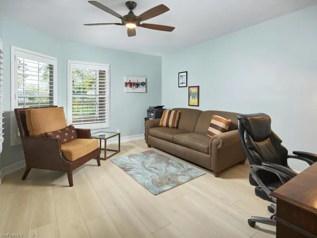 Large den, currently being utilized as a home office. Add a sleeper sofa to accommodate extra guests.