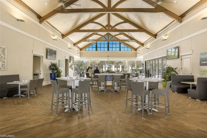 The Breezeway bar and restaurant overlooks a gorgeous resort style pool, also available for use with club membership.