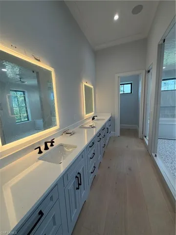 Double vanities and lighted mirrors