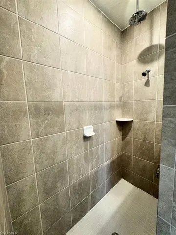 Full bath with tiled shower