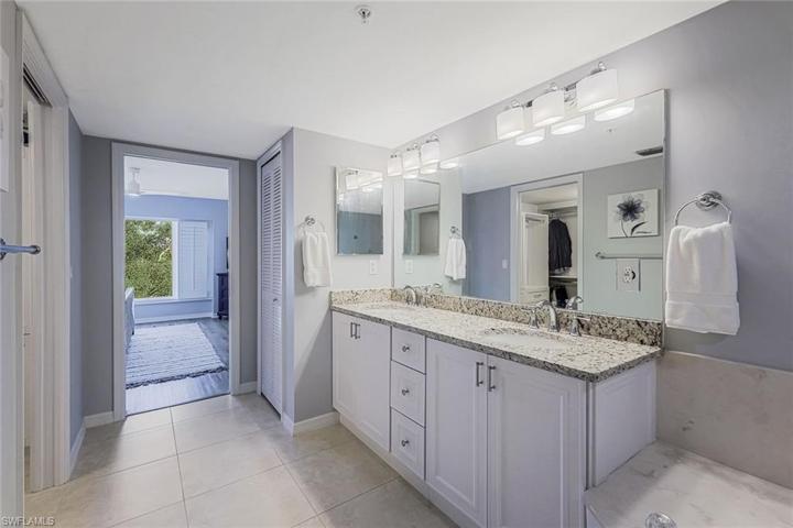Luxurious en suite bath feels like an upscale spa.