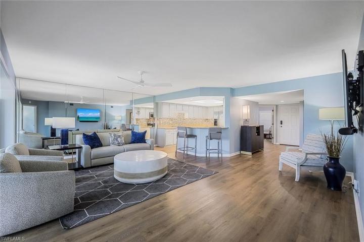 This open concept living space with wood look flooring, will be your Florida retreat!