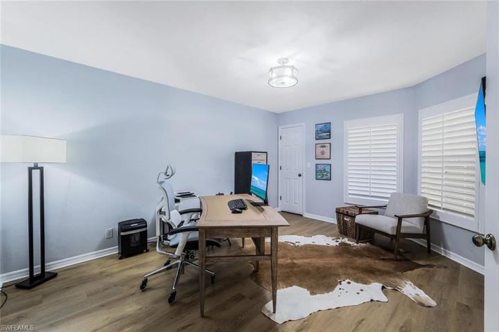 Guest bedroom just off the foyer. This room could also be utilized as a home office/den.
