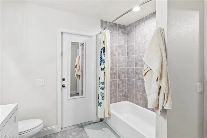 Pool-accessible bathroom offering comfort and practicality, perfect for entertaining or everyday family use.