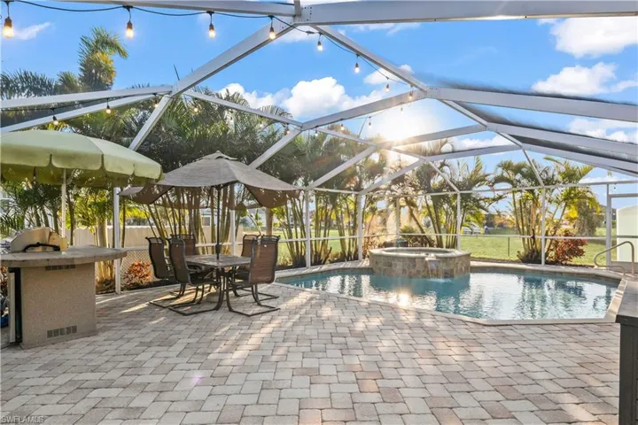 Peaceful backyard space offering privacy and scenic views of the surrounding tropical greenery.