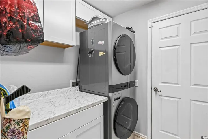 Laundry room with plenty of storage.