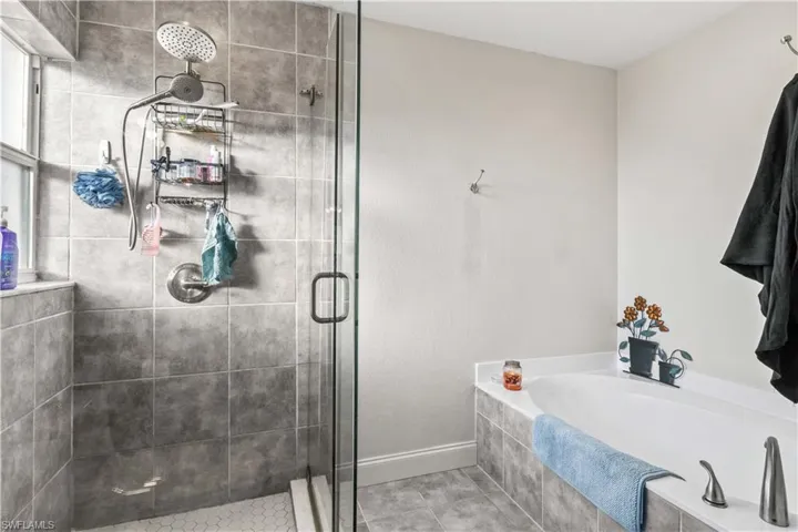 Luxurious soaking tub designed for ultimate relaxation, offering a serene space to unwind after a long day.