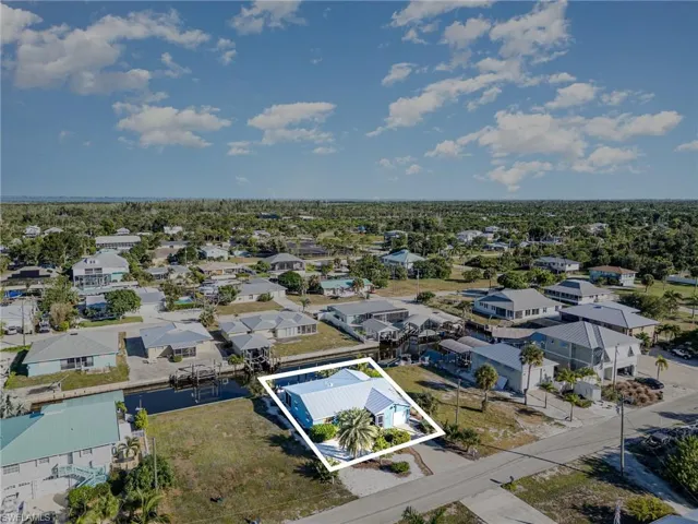 Aerial perspective of suburban area with property boundaries highlighted