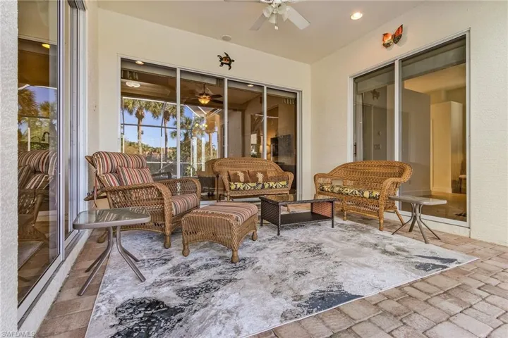 View of patio featuring outdoor lounge area and ceiling fan