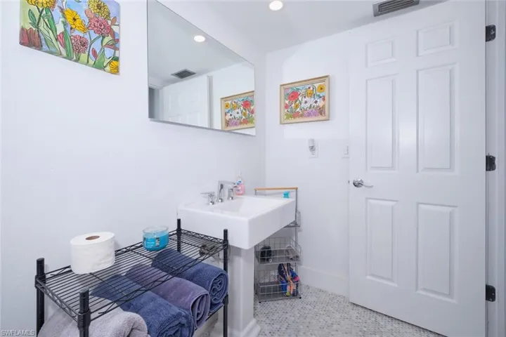Bathroom featuring tile flooring