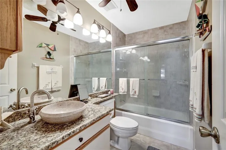 410  Emerald Bay  CIR, Naples, FL 34110