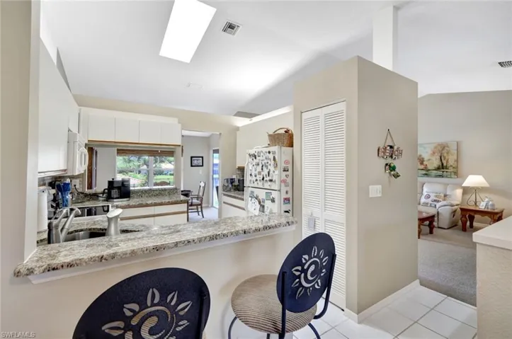 410  Emerald Bay  CIR, Naples, FL 34110