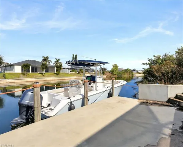Waterfront concrete dock with direct canal access